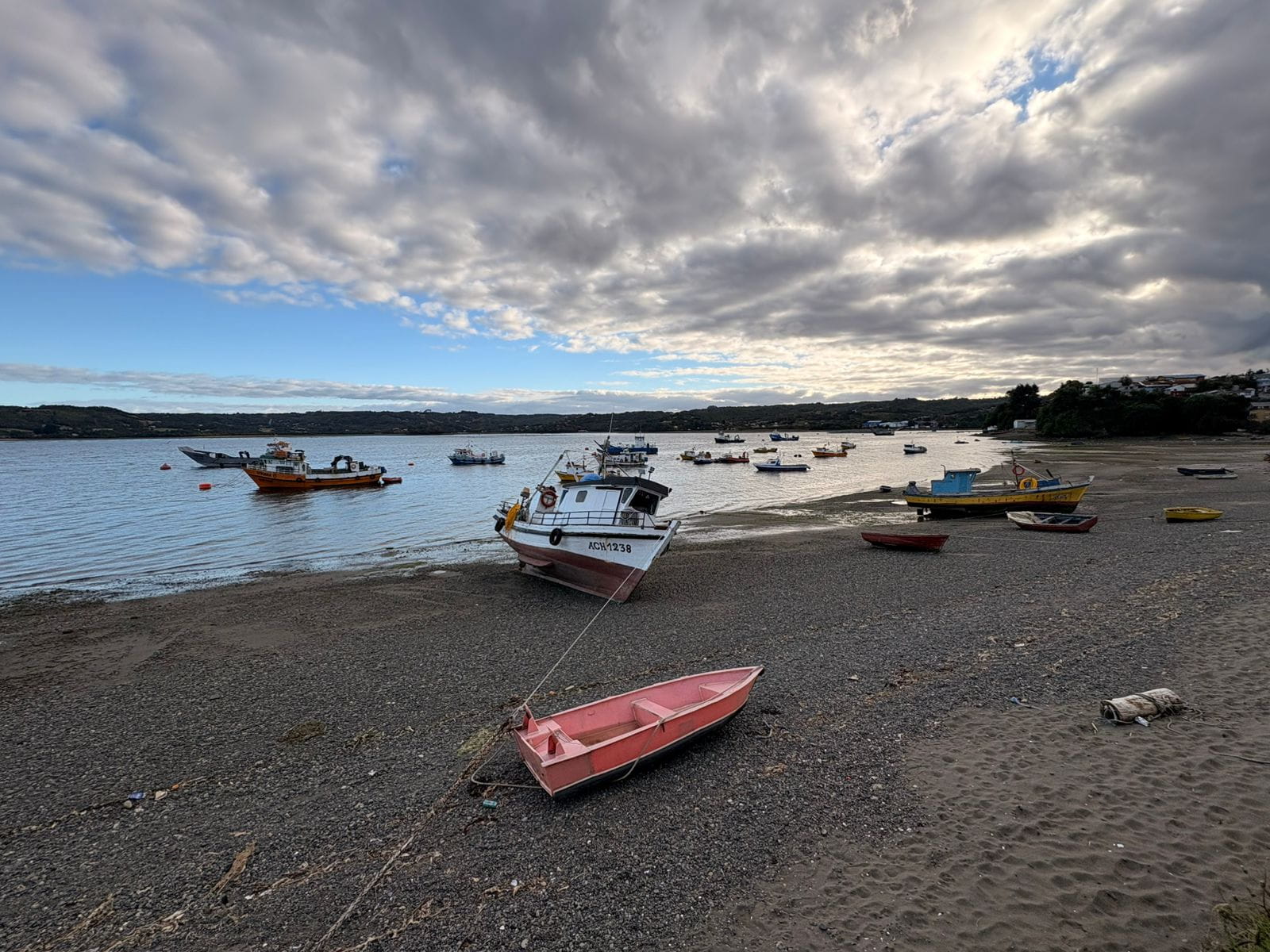 Boats washed up on the shore on Chiloe, an archipelago in Chile