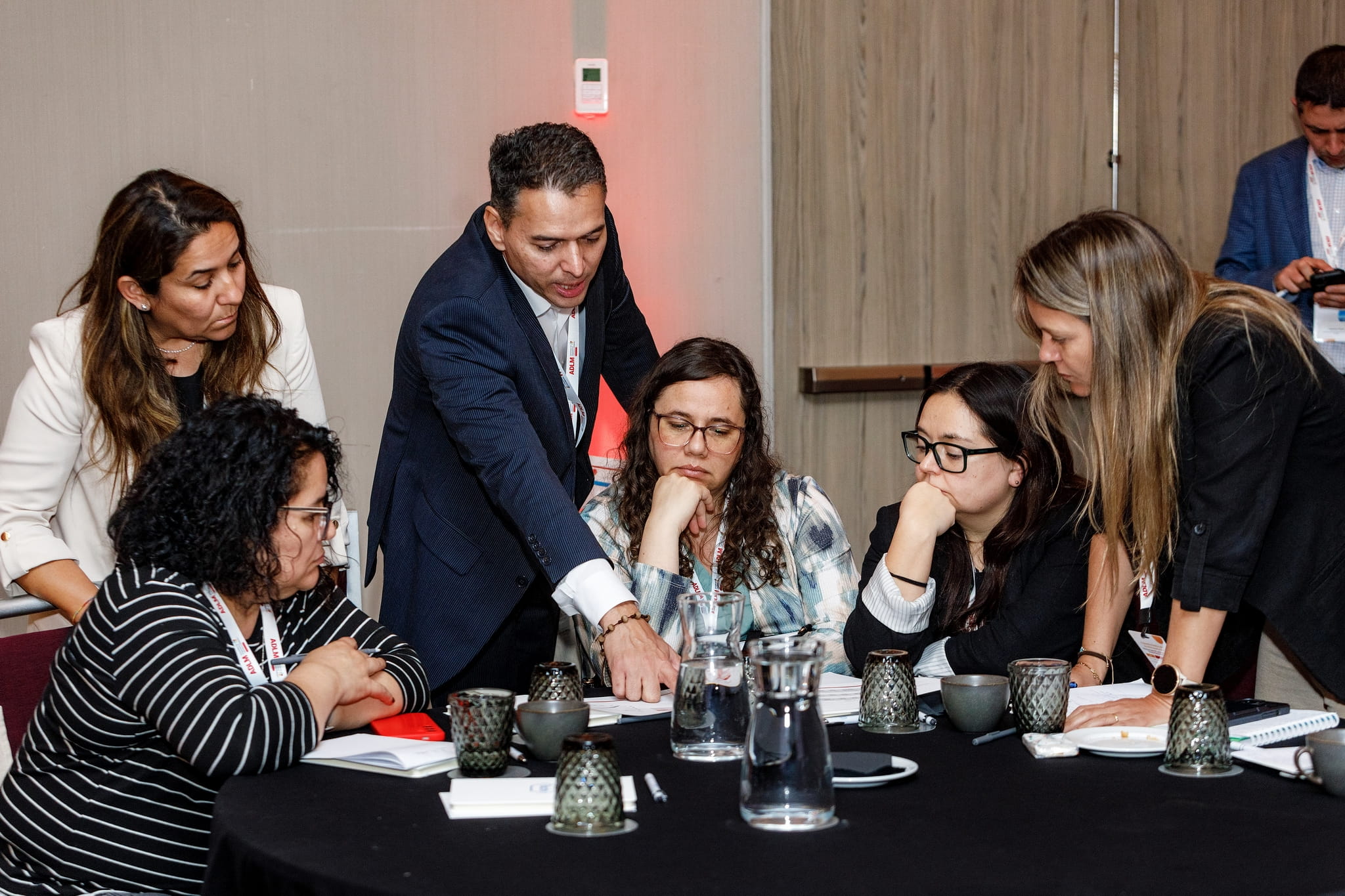 Juan David Garcia working with a group of participants