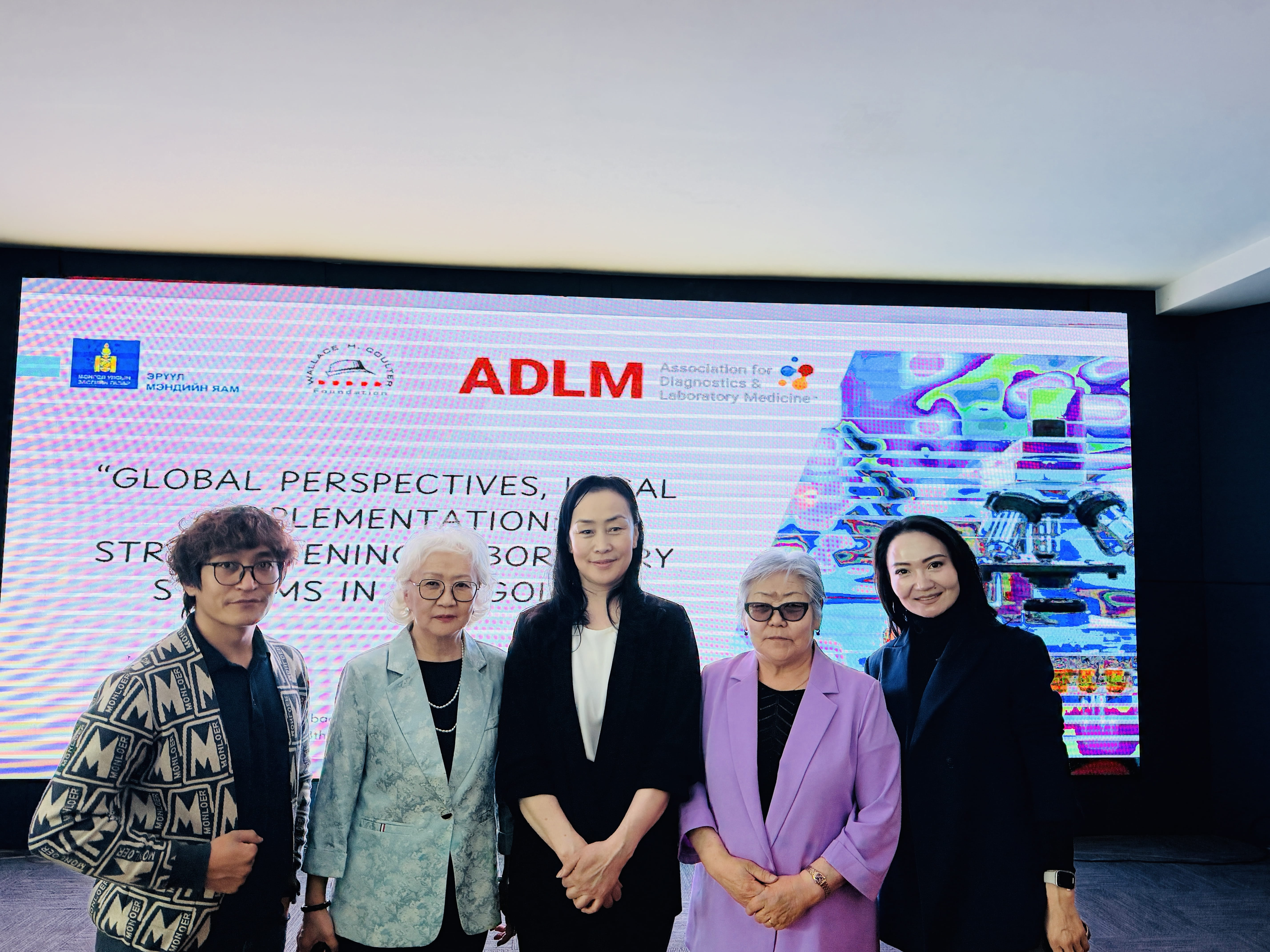 Sarantsetseg Jigjidsuren MD, PhD, posing with colleagues after the ADLM/Mongolian MoH workshop