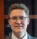 A headshot of Lee Schroeder, member of the Africa Subcommittee