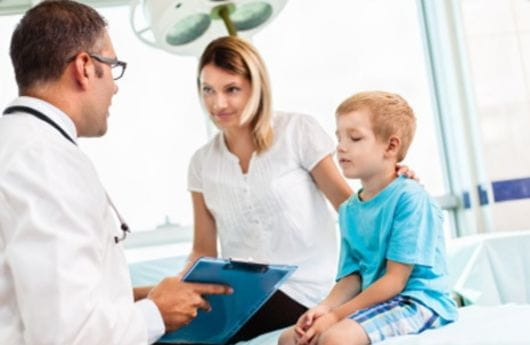 Physician with parent and child